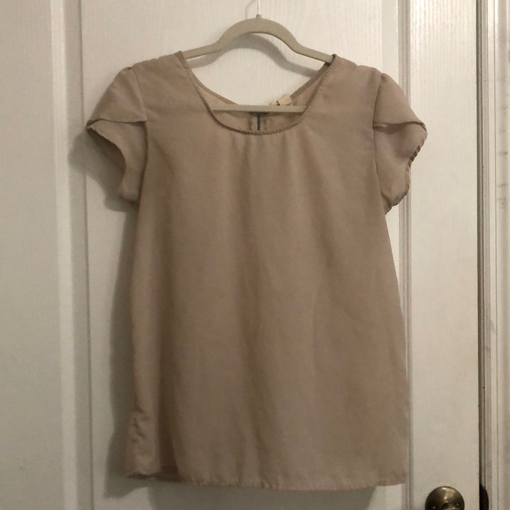 Sheer women’s large beige blouse with capped sleeves